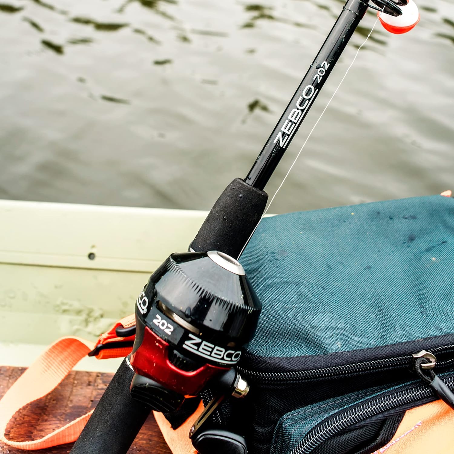 Spincast Reel and Telescopic Fishing Rod Combo, 17-Inch to 5-Foot 6-Inch Pole, Size 30 Reel, Right-Hand Retrieve, Pre-Spooled with 10-Pound Line, Black/Red I4538